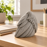 Resting Wing tabletop sculpture in Stone Gray: desk view