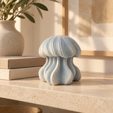 Deep Bell tabletop sculpture in Mist Blue And Ivory: shelf view