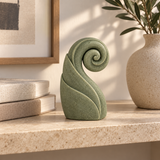 Unfurl tabletop sculpture in Muted Sage Green: shelf view